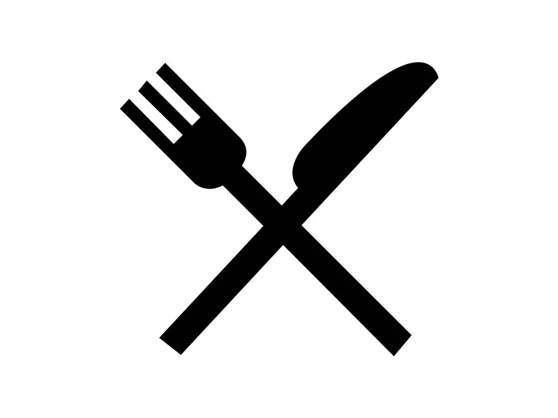 Ein schwarzes Symbol mit einem gekreuzten Besteck, bestehend aus einer Gabel und einem Messer. Es steht für Gastronomie oder Essen.